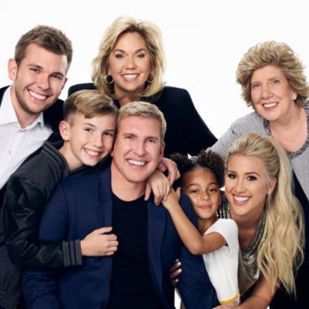 Grayson Chrisley with the Chrisley Knows Best team.